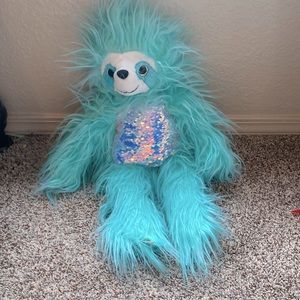 Turquoise fluffy sloth